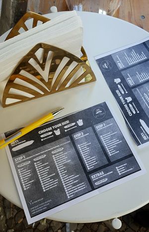 Place your order by choosing what to mix in at Delabuu Ice Cream in Berlin