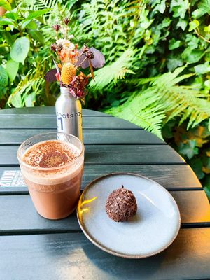 Powerball and Macao Latte on the beautiful terrace at roots - Schanzengraben in Zurich