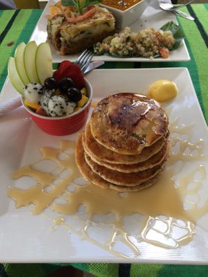 Vegan pancakes with fruit, syrup and hopefully vegan margarine? at Duni in Minca