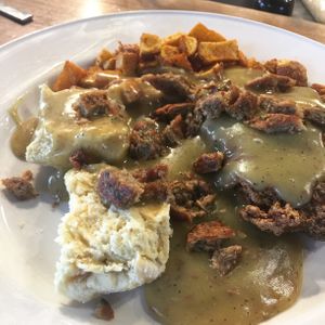 Brunch Chicken, biscuits and gravy plate at Village Taco in Alexandria
