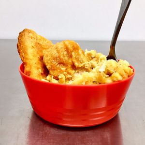 BTS Lunch Menu
Fish and  Mac' n' Cheese:
Rich, creamy, velvety, vegan cheese sauce tossed with tender pasta, baked till golden, served with crispy fish less files.
 at Chip and Kale in Pittsburgh