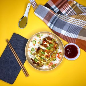 Tofu Katsu Curry: 
Colorful warmly spiced aromatic bowl of goodness. Japanese style crispy golden panko breaded tofu with rich, creamy, fruity curry sauce, carrots and peas. at Chip and Kale in Pittsburgh