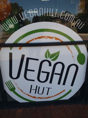 Outdoor signage at Vegan Hut in Maitland
