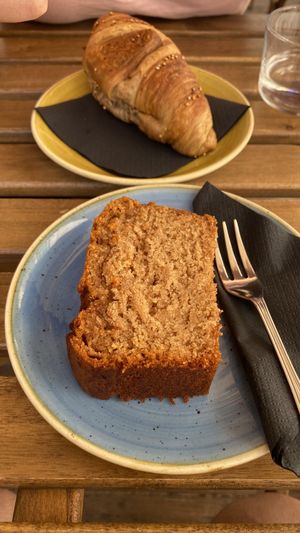Plum cake and croissant   at Barnum Cafe in Rome
