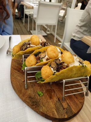 Tacos con tartufo, crema di anacardi, patate e "fake meat" fatta da loro at Pesto di Pistacchio in Trani