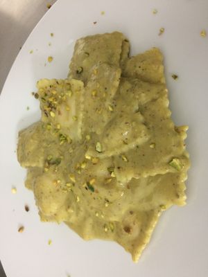 Ravioli filled with pumpkin and soy ricotta cheese, seasoned with pistachio pesto at Pesto di Pistacchio in Trani