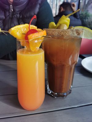 Vegan Caesar & tequila sunrise mimosa. at MeeT in Yaletown in Vancouver