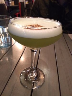 A yummy cocktail that I forgot the name of. I think it has some pineapple juice? It was tasty!  at MeeT in Yaletown in Vancouver