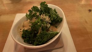 Kale with gravy  at MeeT in Yaletown in Vancouver