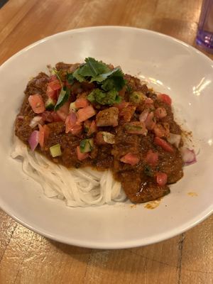 Butter ‘chicken’ on rice noodles   at MeeT in Yaletown in Vancouver