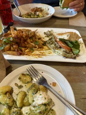 We shared gnocchi with whipped feta(amazing) and a pesto chicken Sammy with upgraded butter chicken poutine fries. Fantastic!  at MeeT in Yaletown in Vancouver