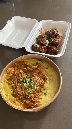 Mac and Cheese with Butter Chicken + Cauliflower Wings   at MeeT in Yaletown in Vancouver