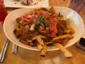 Butter Chikkin Poutine at MeeT in Yaletown in Vancouver