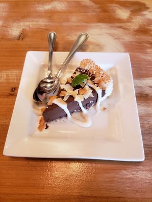 Chocolate torte with vanilla ganache and coconut crust at MeeT in Yaletown in Vancouver