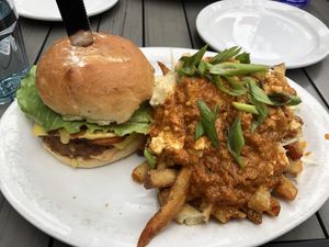 Double-Double Burger with Butter Chicken Poutine at MeeT in Yaletown in Vancouver