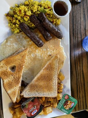 Big Breaky (Breakfast) with Beyond Sausages. Good breakfast but missing the fruit and mini muffin that are included  at Hometown Sports Grill in Ottawa