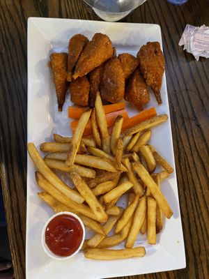 Vegan Chi’Kn Platter - amazing wings. Ordered them hot but not too hot for us  at Hometown Sports Grill in Ottawa
