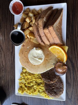 Vegan Big Breakfast toast, home fries, pancake, vegan Beyond Sausages, Tofu Scrambled and vegan mini muffin   at Hometown Sports Grill in Ottawa