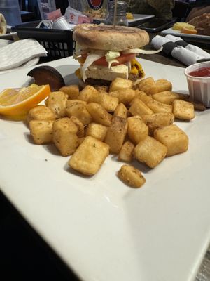 Vegan Breakfast Sandwich with home fries, fruit and vegan muffin   at Hometown Sports Grill in Ottawa