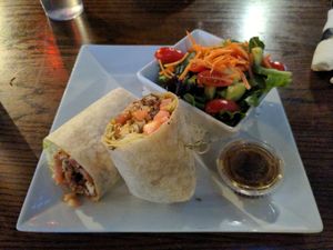 Vegan cauliflower wrap with side salad at Hometown Sports Grill in Ottawa