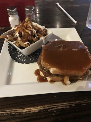 Hot hamburger sandwich and poutine 🤤 at Hometown Sports Grill in Ottawa