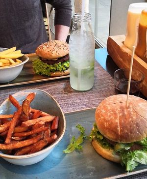 Mushroom burger and avocado cream burger at Hans Im Glück in Berlin