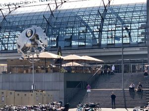 outside sitting area (umbrellas) at Hans Im Glück in Berlin