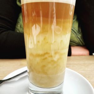 Latte macchiato with oat milk at Cafe Affenbrot in Luebeck