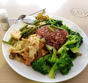 Lots of Vegetable options. This plate has brown rice. You can choose olive rice too. at Yum Yum Yummy Vegetarian - Bukit Merah Central in Central Singapore
