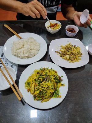 Turmeric Noodles and braised mushroom at Huyen Trang in Da Nang