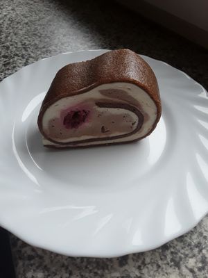 Delicious raw vegan desert with vanila, cocoa and coffe flavour, little raspberrie added.  at Ro Bufet in Pribram