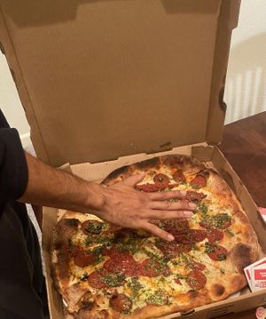 vegan 16" / hand for reference   at Fine Folk Pizza in Fort Myers