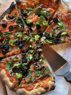 Vegan vegetable pizza with house made cashew cheese  at Fine Folk Pizza in Fort Myers