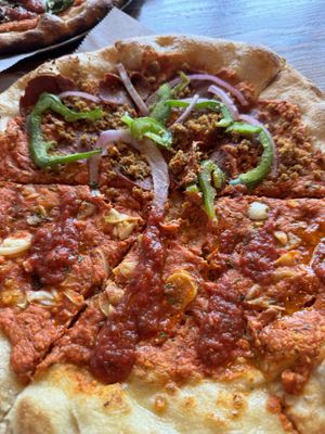 1/2 Cashew picante and 1/2 vegan supreme  at Fine Folk Pizza in Fort Myers