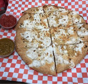 Vegan garlic bread with marinara and curry sauce  at The Curry Pizza Company - Shaw Ave in Fresno