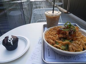 Spicey Thai Salad, Chlostess cupcake and iced latte at By Chloe - Tower Bridge in London