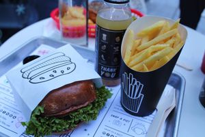 The Guac Burger with Air baked fried and a “Howl” Cold-Pressed Juice at By Chloe - Tower Bridge in London