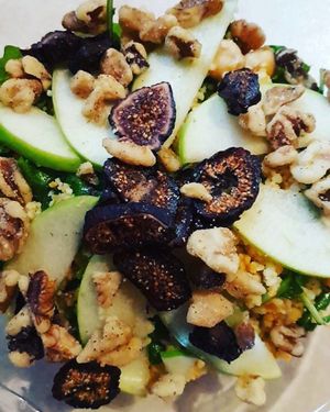 Green salad with figs, toasted walnuts and green apple. at Stir It Up in Charlottetown