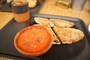 toast with tomato-garlic sauce at Tambake in Praia