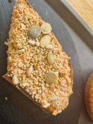 Tofu pesto tomato spread with yummy seeds at Tambake in Praia