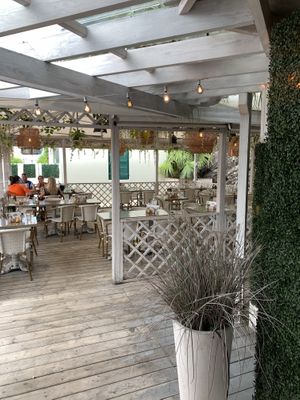 2 outdoor seating terraces at Village Pantry in Hamilton