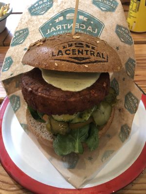 Vegan patty, cashew cashew cheese with added gherkins at La Central in Barcelona