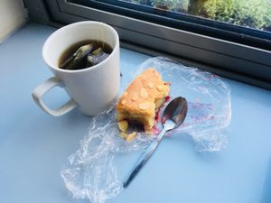 At home & loving the cake  at Greendays Cafe in Liverpool