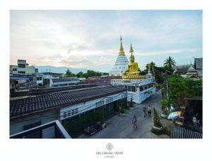 View of Buddha  Behind the Restaurant on morning at Sri Chiang Yeun House in Chiang Mai