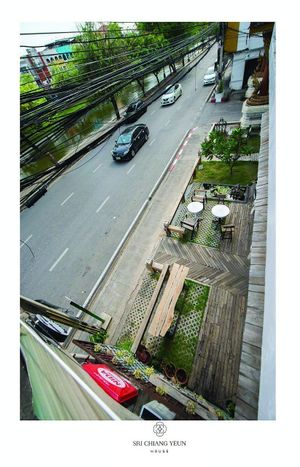 Front view of the restaurant on the morning at Sri Chiang Yeun House in Chiang Mai