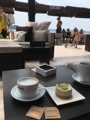 Soy cappuccino and lemon cake at Kavarna Cacao in Portoroz