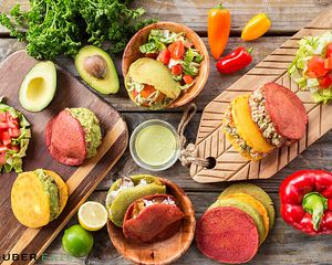 All servings are made at the moment and bring two arepas and a side salad. Super filling. at Reina Vegana in Hollywood