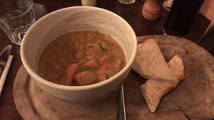 Sweet potato, chickpea and coconut curry with pita. - Onion, celery and courgette  at The Wollaton Pub in Wollaton