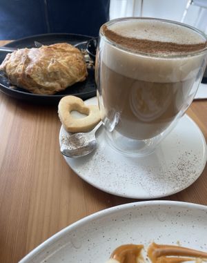Chai, heart shaped biscuit and a Breakkie pastry  at Way2live Cafe & Pantry in Hammondville