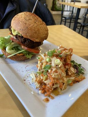 Cheeseburger (homemade patty) and spicy mango cole slaw   at Cafe Jardin in Verdun